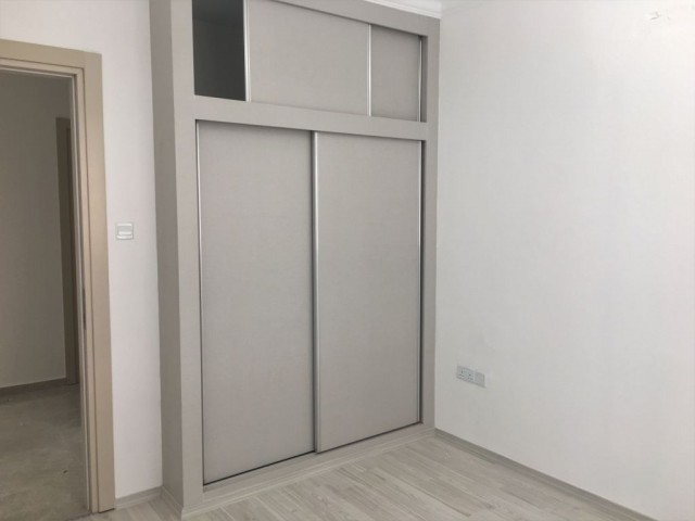 GİRNE MERKEZ DE 3+1 EŞYASIZ SATILIK 88.000 STG DAİRE