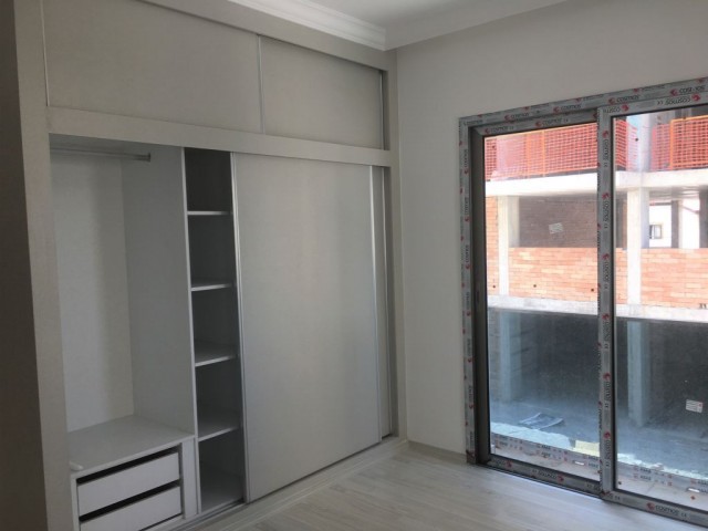 GİRNE MERKEZ DE 3+1 EŞYASIZ SATILIK 88.000 STG DAİRE