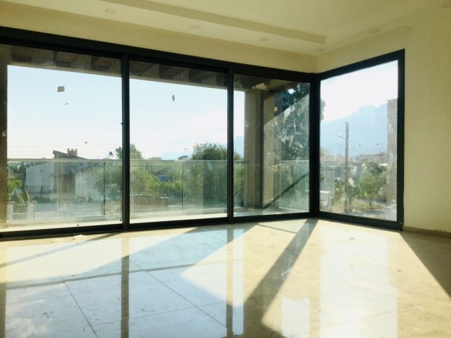 2+1 flats in Cyprus Girne Alsancak with modern design large terrace and garden use.