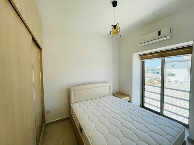 NEWLY FURNISHED GARDEN AND TOP FLOOR APARTMENTS ON A SITE WITH A POOL NEAR THE MAIN STREET IN KYRENIA OZANKOY ** 