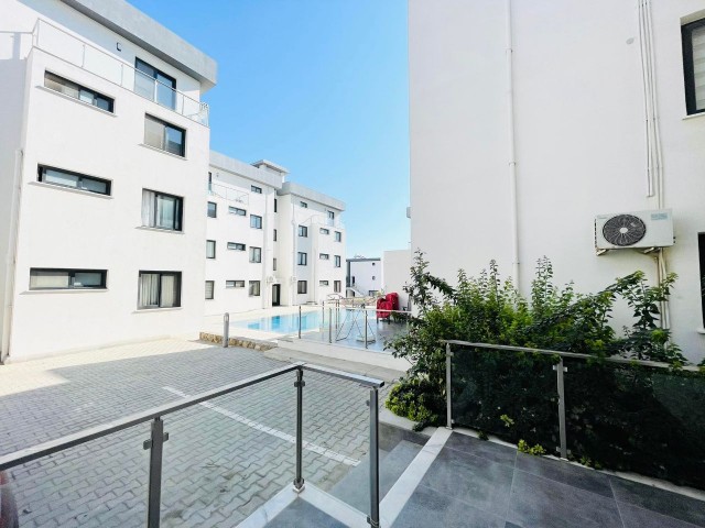 CYPRUS KYRENIA ALSANCAK NEW 1 + 1 GARDEN FLOOR APARTMENT FOR SALE ON A SITE WITH A POOL ** 