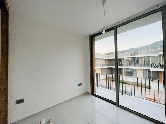 CYPRUS KYRENIA ALSANCAK 1 + 1 APARTMENT WITH AFFORDABLE PRICES CLOSE TO THE MAIN STREET ** 