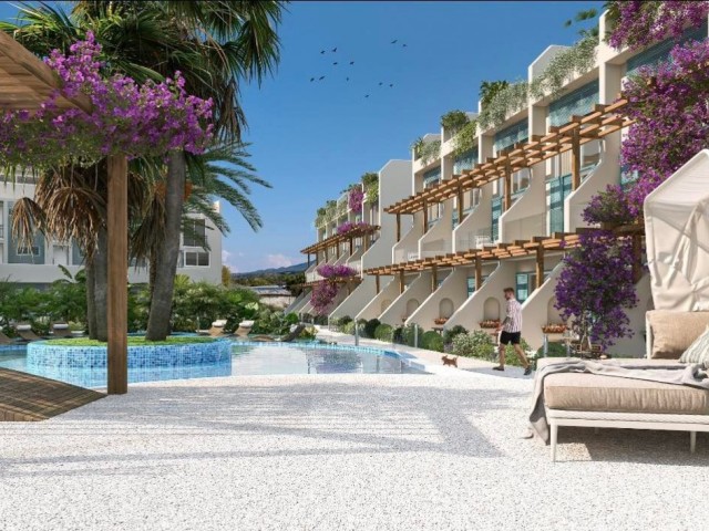 Апартаменты 1+1 с великолепным садом и верхним этажом у моря в элитном комплексе в Кирении Эсентепе, Кипр