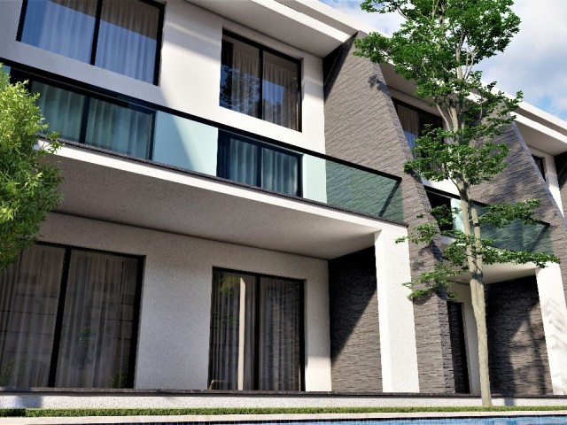 آپارتمان 2+1 با کف باغ و تراس پشت بام برای فروش در سایت در منطقه ساحلی لانگ بیچ ایسکله قبرس