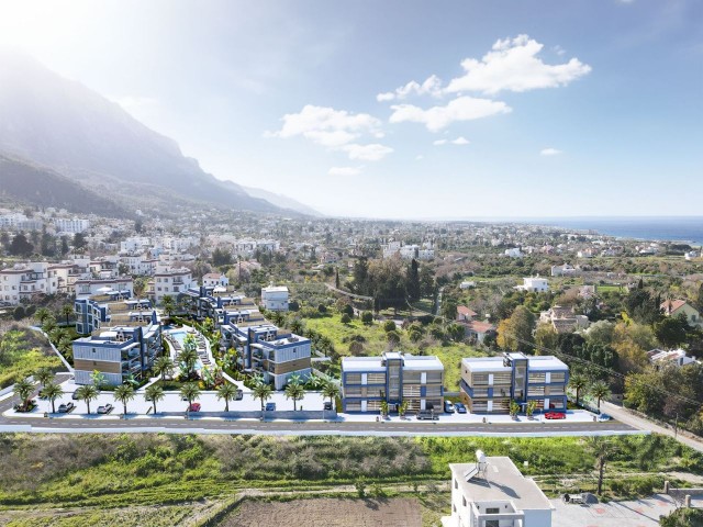 2+1 WOHNUNG ZU VERKAUFEN MIT GARTENBODEN ODER DACHTERRASSE AUF EINEM GELÄNDE MIT POOL IN ZYPERN GIRNE LAPTA REGION