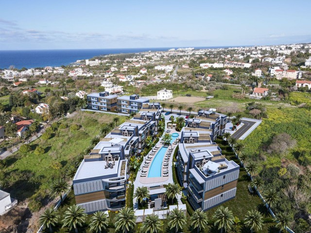 2+1 WOHNUNG ZU VERKAUFEN MIT GARTENBODEN ODER DACHTERRASSE AUF EINEM GELÄNDE MIT POOL IN ZYPERN GIRNE LAPTA REGION