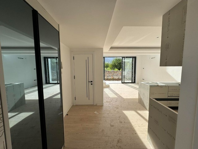 1+1 Maisonette-Wohnungen an einem ganz besonderen Ort in fußläufiger Entfernung zum Meer zum Verkauf in Zypern Kyrenia Karşıyaka