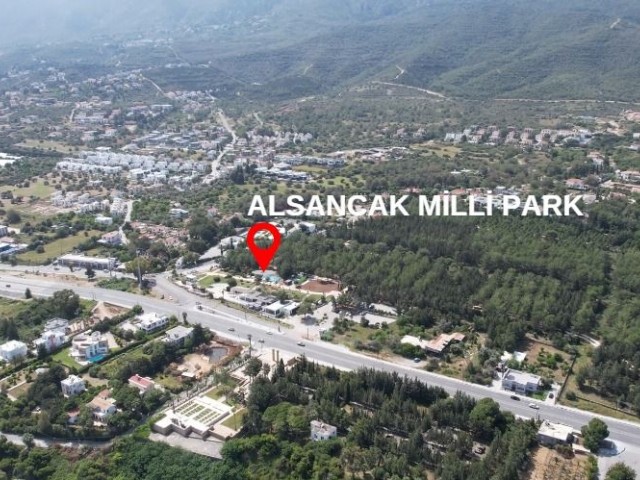 1390 m2 großes Grundstück zum Verkauf mit uneingeschränktem Berg- und Meerblick in der Region Kyrenia Alsancak auf Zypern