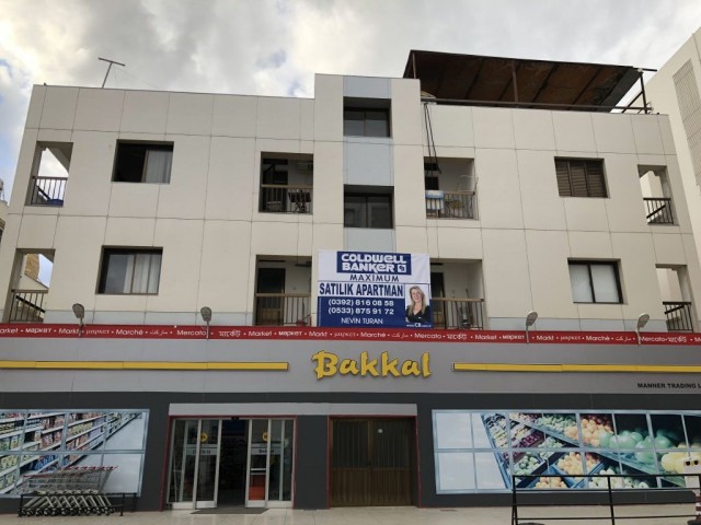 GİRNE MERKEZ DE , KIYMETLİ DÜKKANI DA OLAN  SATILIK APARTMAN