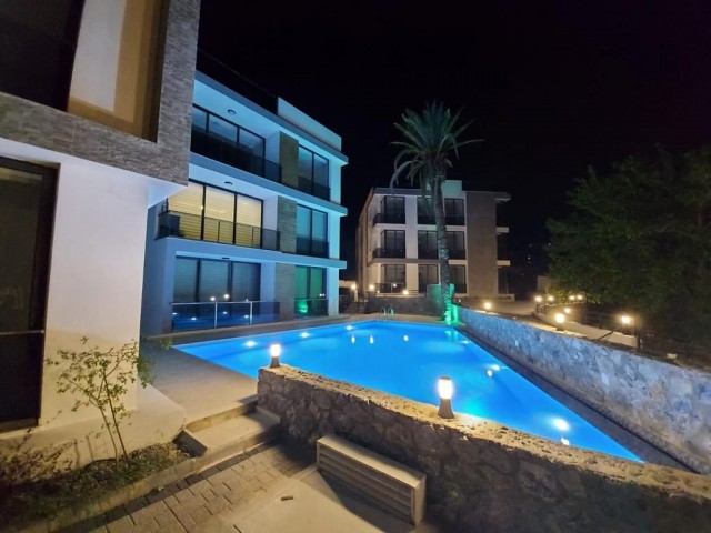 2+1 penthouse or garden apartment for sale in a complex with pool in Lapta area, Girne.