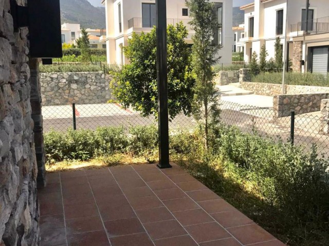 1+1 apartment with garden for sale in a Lux, Modern, Pool Complex in Alsancak.