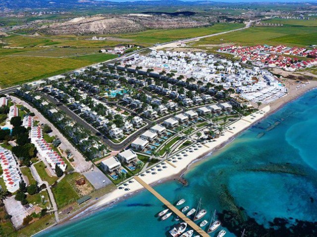 Kıbrıs'ta İskele Bogaziçi'de inşaatı tamamlanmış 420 konutlu satılık daire ve villa projesi