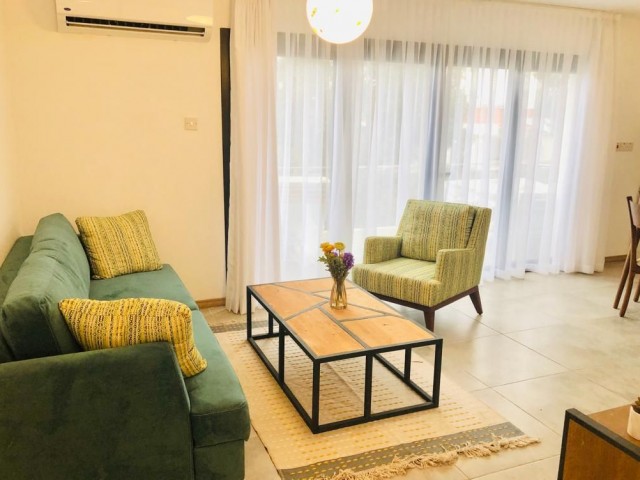 1+1 Luxury apartment with garden for rent in Alsancak, in a complex with pool