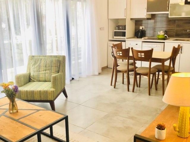 1+1 Luxury apartment with garden for rent in Alsancak, in a complex with pool