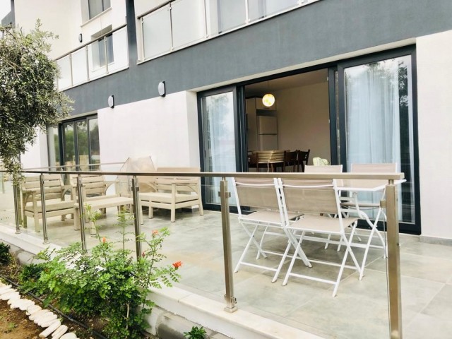 1+1 Luxury apartment with garden for rent in Alsancak, in a complex with pool