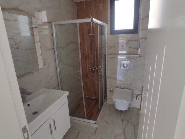 NEW 2+1 flat for sale in Alsancak in beautiful site with swimming pool