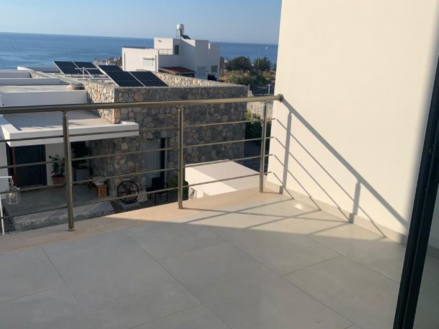 1+1 loft apartment for sale in Esentepe, Sea view