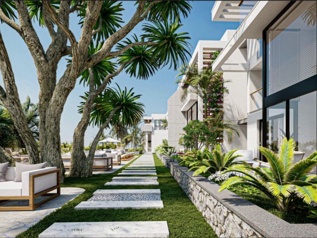 1+1-Wohnung direkt am Meer mit Garten und 1+1-Penthouse zum Verkauf in Esentepe