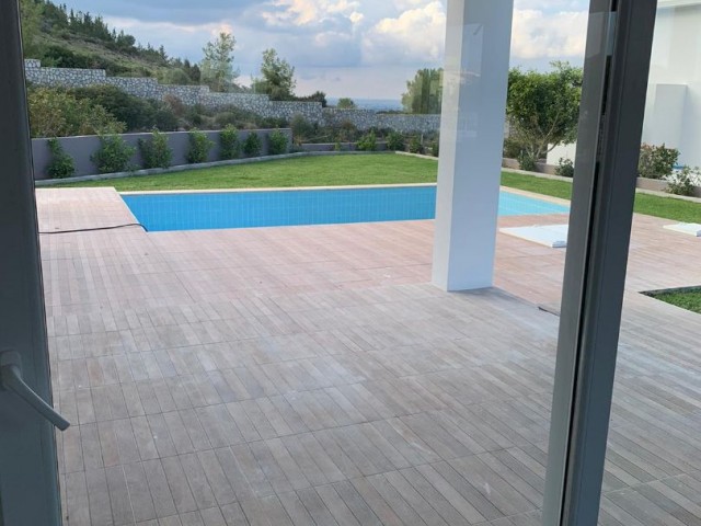 3+1 villa with pool for sale in Çatalköy, Sea view