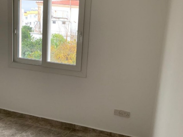 3+1 ground floor apartment with garden for sale in Alsancak