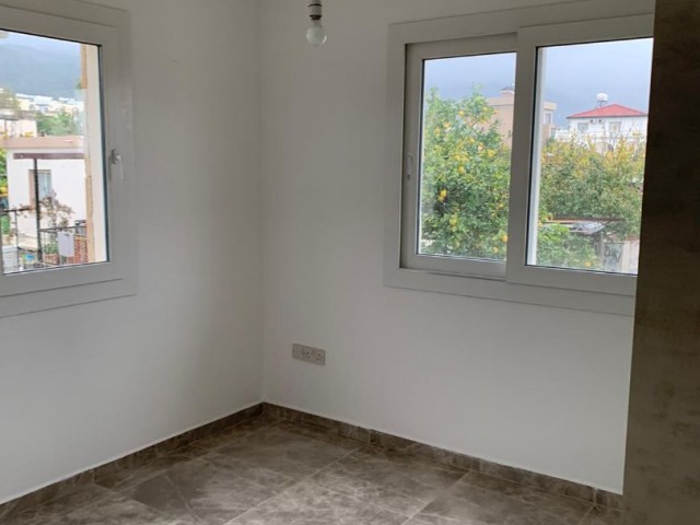 3+1 ground floor apartment with garden for sale in Alsancak