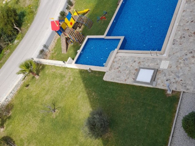 2+1 apartment for sale with pool in Lefke