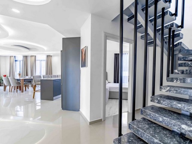 2+1 Wohnung zum Verkauf mit Mieteinnahmen in einem Hotelkonzept im Zentrum von Kyrenia