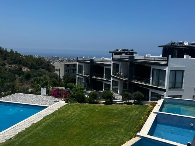 2+1 luxury apartment for sale with communal swimming pool in Girne , Belapais