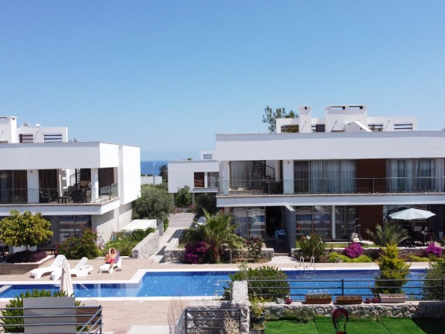 2+1 Wohnung zum Verkauf im Emtan Green Park, in der Nähe von Escape Beach und Nationalpark in Alsancak