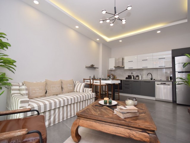 Роскошная полностью меблированная квартира 2+1 на продажу на специально спроектированном участке в центре Кирении