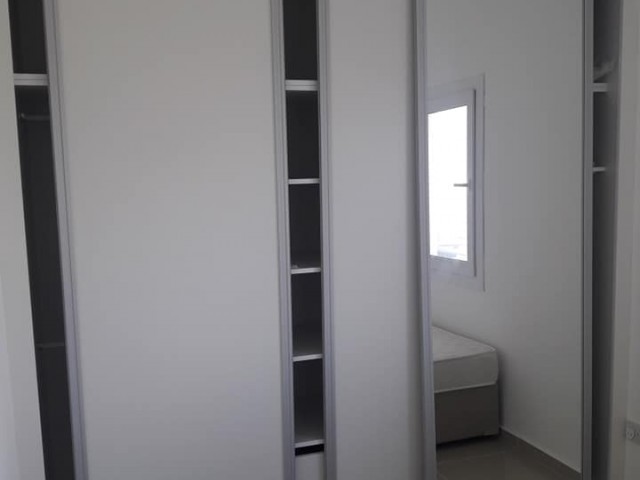 NEUE WOHNUNG ZUM VERKAUF IN YENIBOZICI FÜR INFORMATIONEN:05338867072 ** 