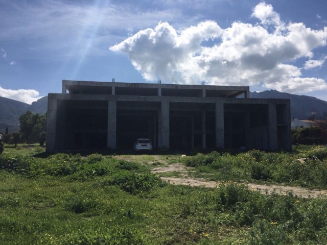 2,600 m2 UN FINISHED BUSINESS BUILDING  IN KARAOĞLANOĞLU ON THE MAIN ROAD WITH 4.5 DONUMS OF LAND