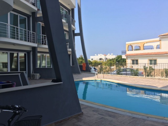 ALSANCAK ,A STUDIO APARTMENT WITH COMMUNAL SWIMMING POOL 