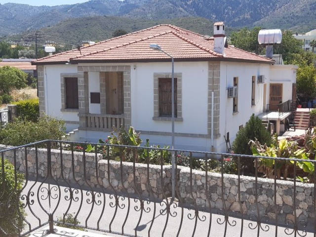 A villa with 3 Bedrooms  and a small garden close to the city centre and markets with sea and mountain views