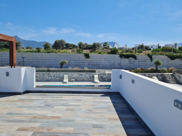 A beautiful 3 +1 BUNGALOW with communal swimming pool and stunnind sea and mountain views. Doğan Boransel - 0533-8671911