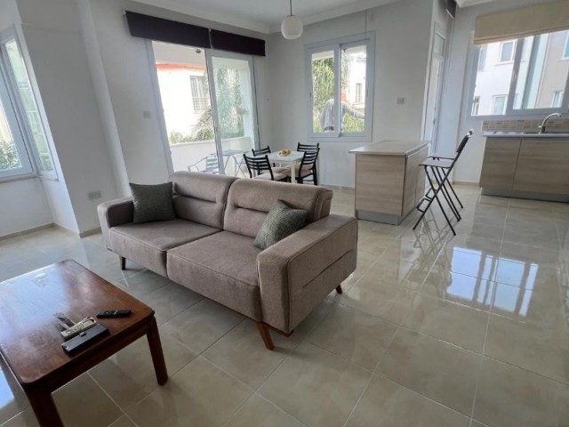 IN ALSANCAK 1+1 FULLY FURNISHED NEW APT WITH WIDE BALKONY AND COMMON SWIMMING POOL