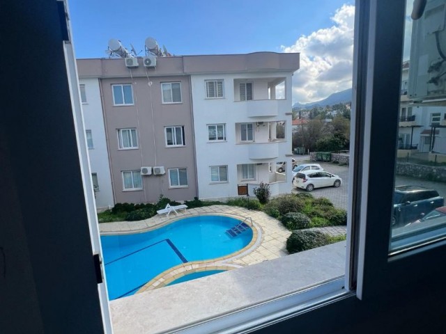 IN ALSANCAK 1+1 FULLY FURNISHED NEW APT WITH WIDE BALKONY AND COMMON SWIMMING POOL