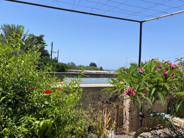 GİRNE , KARŞIYAKA'da  very good condition and FULLY FURNISHED 2+1 BUNGALOW with  1,761 m2  GARDEN SIZE AND WATER WELL WITH EXCELLENT SEA AND MOUNTAIN VIEW  : DOĞAN BORANSEL : Mobile/Whatsapp : +90-5338671911