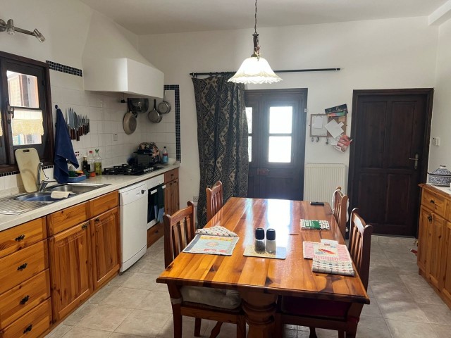 GİRNE , KARŞIYAKA'da  very good condition and FULLY FURNISHED 2+1 BUNGALOW with  1,761 m2  GARDEN SIZE AND WATER WELL WITH EXCELLENT SEA AND MOUNTAIN VIEW  : DOĞAN BORANSEL : Mobile/Whatsapp : +90-5338671911