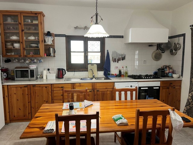 GİRNE , KARŞIYAKA'da  very good condition and FULLY FURNISHED 2+1 BUNGALOW with  1,761 m2  GARDEN SIZE AND WATER WELL WITH EXCELLENT SEA AND MOUNTAIN VIEW  : DOĞAN BORANSEL : Mobile/Whatsapp : +90-5338671911