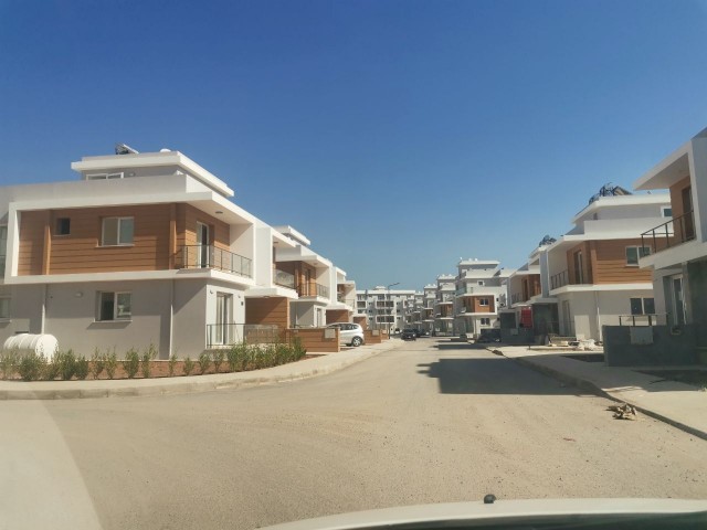 Semi detached house with its own large garden. There are only 10 such houses in the residential complex! New modern residential complex 'Royal Sun Elite' in the Mediterranean resort of Northern Cyprus. 15 minutes walk to the sandy 'Long Beach' (cafes, restaurants, amusement park), 10 minutes to the 