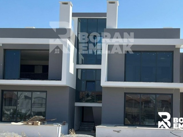 3+1 New Apartment With A Garden & Full House Appliances  128,000 GBP  (Will Be Completed In Two Months) 