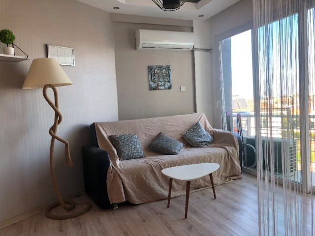 Studio apartment for sale on a site with a luxuriously furnished communal pool in the central location of Alsancakta ** 