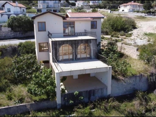 4 + 1 villas for sale in Çatalköy with an equivalent title deed of 80% completed in 1.5 acres of land with excellent sea views ** 