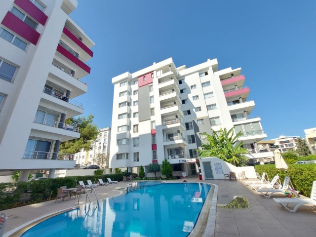 3+1 furnished luxury flat for rent in a secure complex with a communal pool in the center of Kyrenia