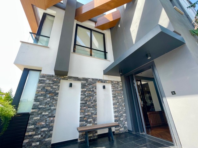 All-expenses-paid villa for sale in Çatalköy with a modern architecture and a central location with a pool