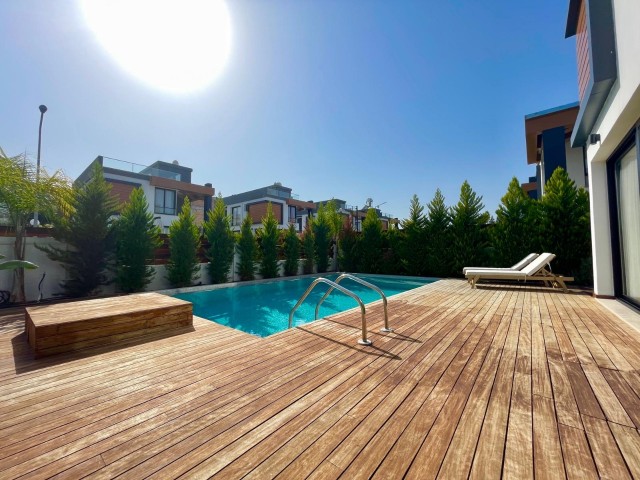 Komplett bezahlte Villa zum Verkauf in Çatalköy mit moderner Architektur und zentraler Lage mit Pool