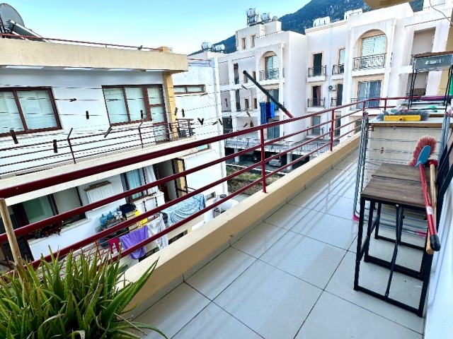 UNFURNISHED 3+1 flat for sale with sea view in Lapta, within walking distance to the market and the bus stop, in a complex with a shared pool