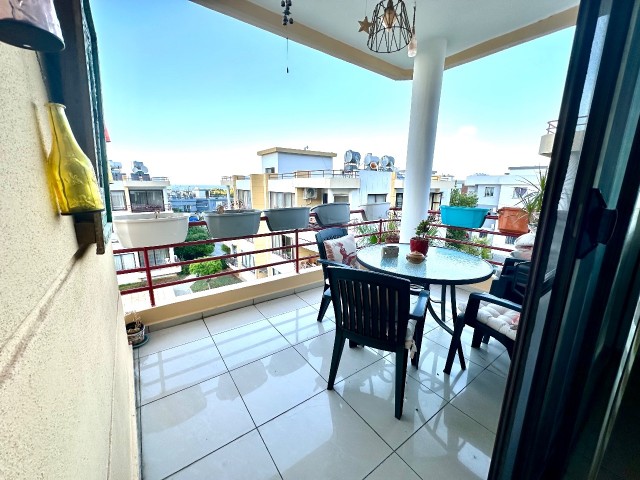 UNFURNISHED 3+1 flat for sale with sea view in Lapta, within walking distance to the market and the bus stop, in a complex with a shared pool