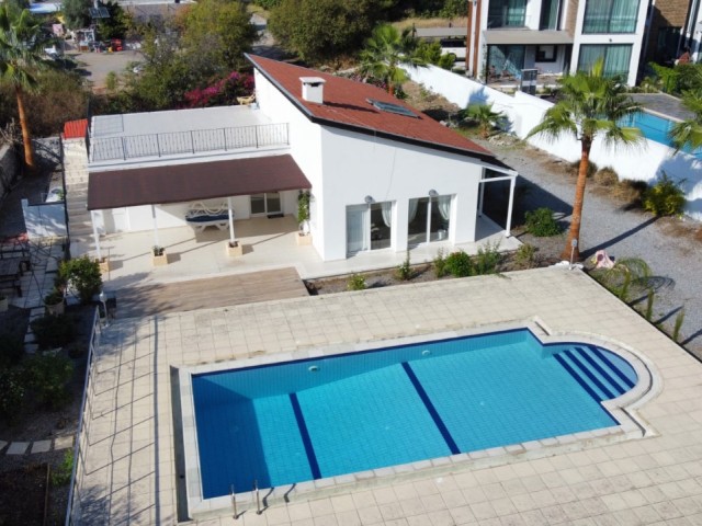 3+1 detached house for rent with two villas in a central location in Alsancak, with a shared pool, garden, fireplace, three bathrooms